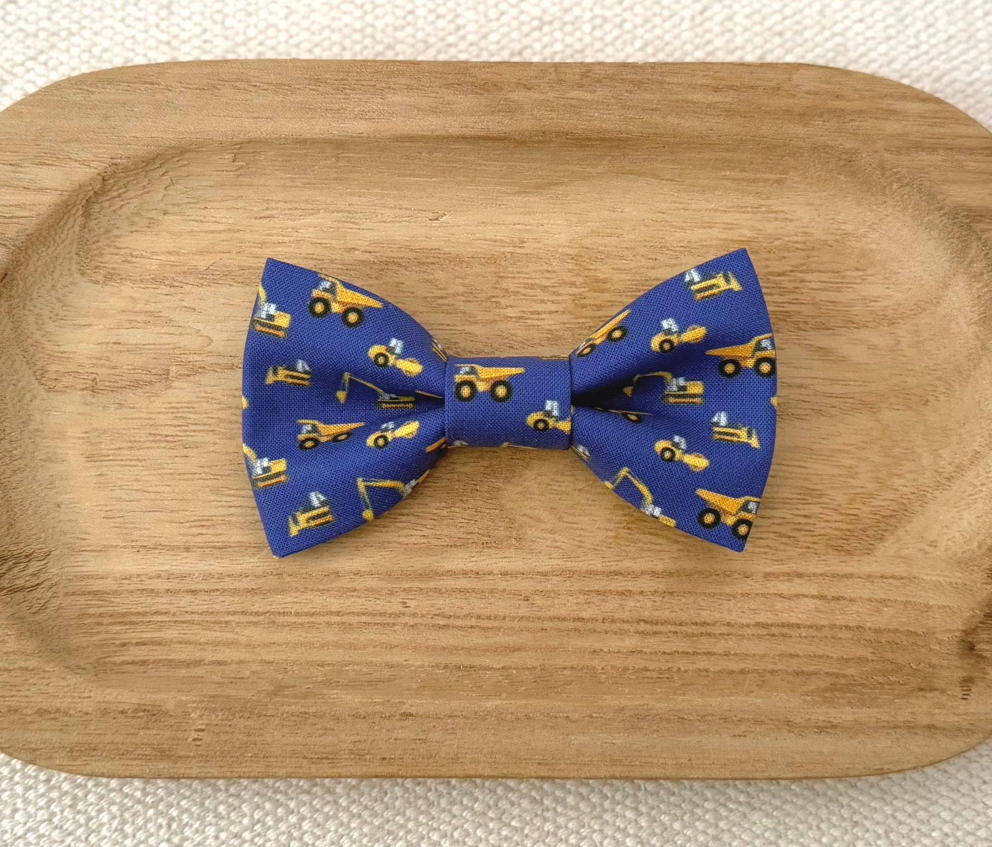 Blue bow tie with yellow construction vehicles