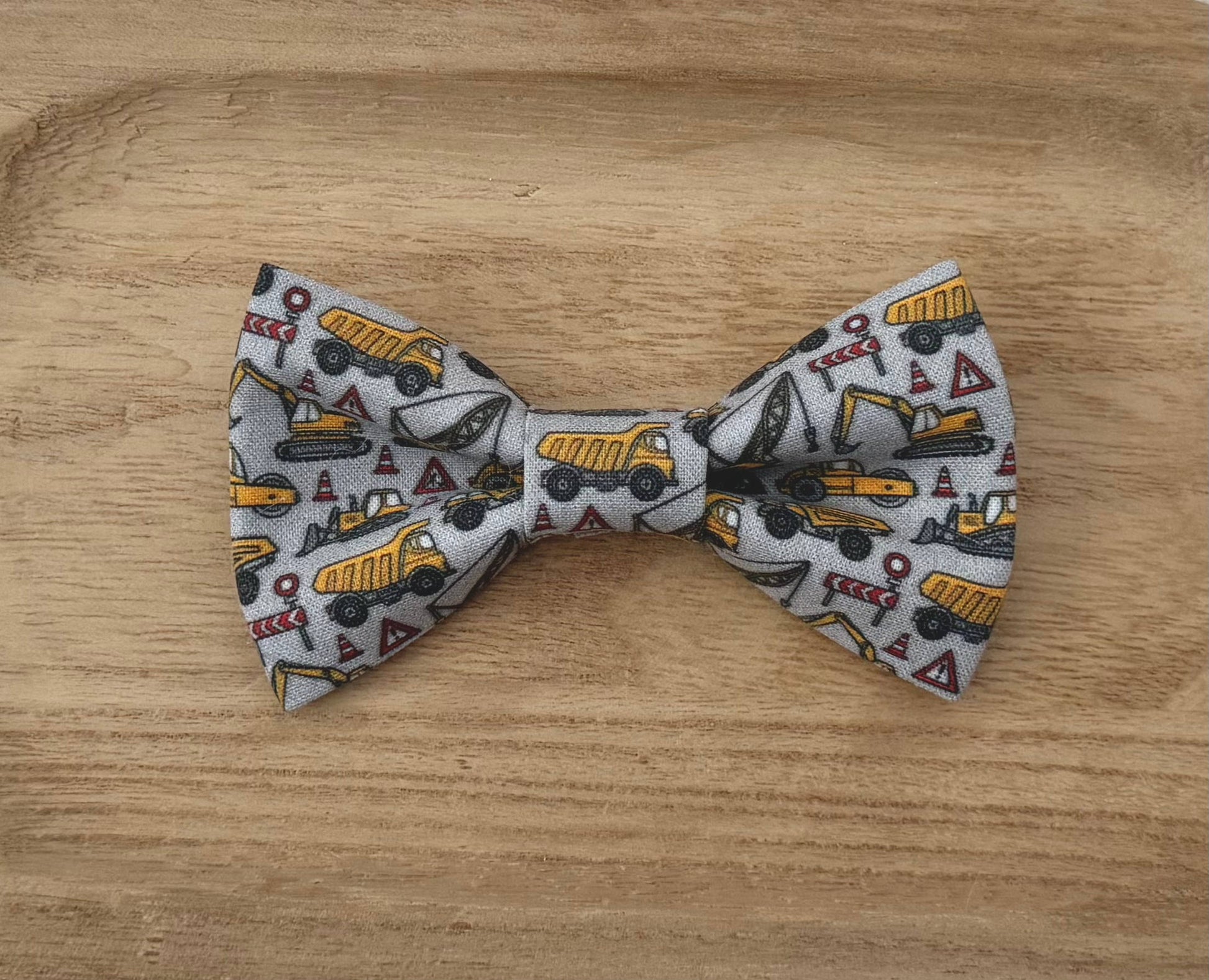 Bow tie with yellow construction vehicle pattern